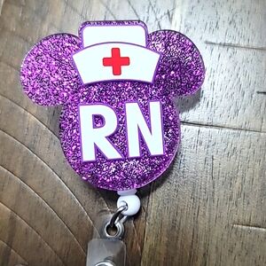 RN mouse ears purple badge reel